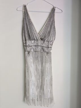 Ivory Sequin V-Neck Mini Dress with Cutout Waist